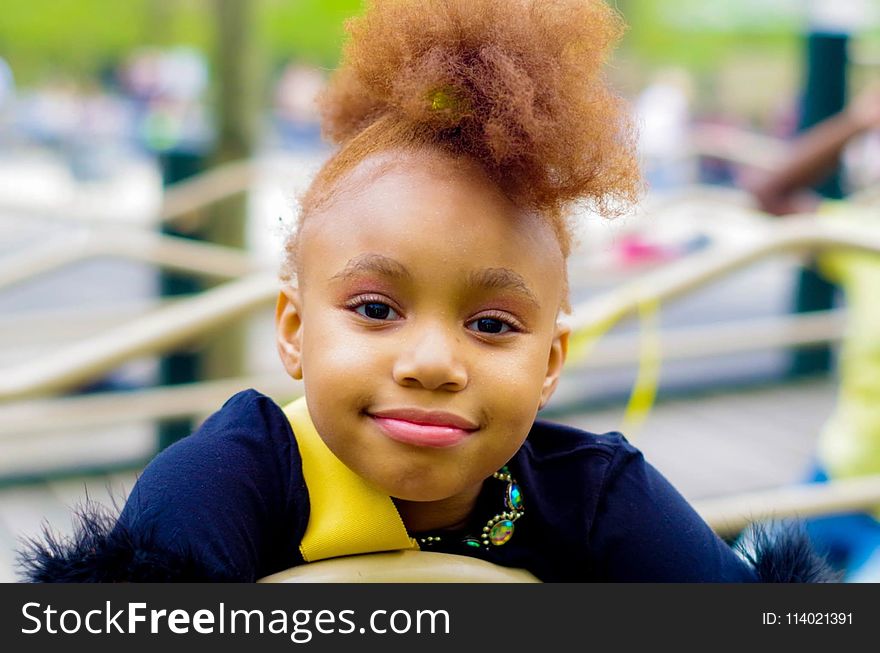 Girl In Blue Top Focus Photo