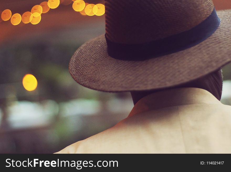 Shallow Focus Of Man In Brown Hat