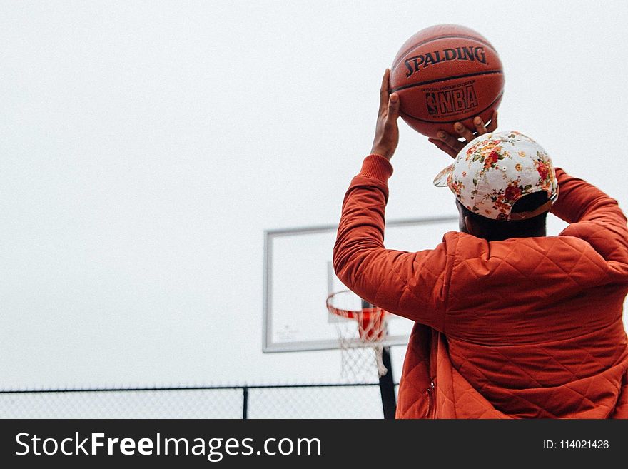 Person Holding Basketball