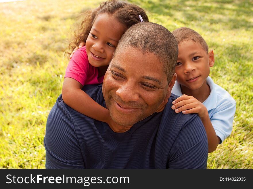 African American Father And His Children.