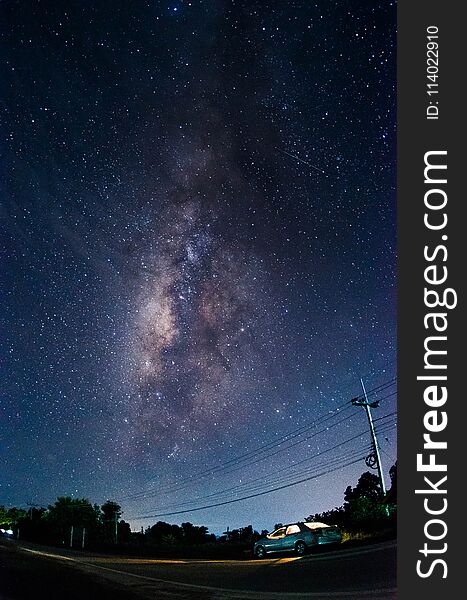 The Milky Way With The Tree And Car In Foreground