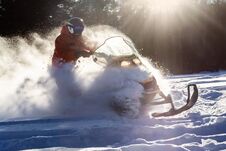 Athlete On A Snowmobile Royalty Free Stock Photography