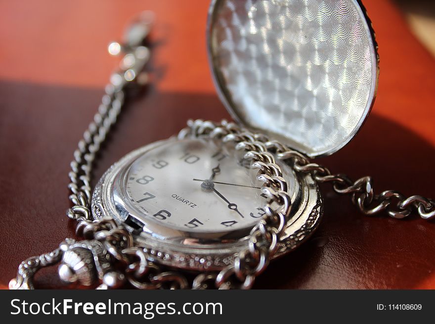 Round Silver-colored Pocket Watch