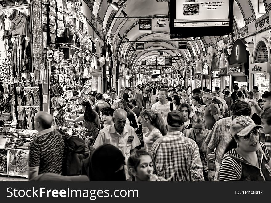 Grayscale Photo of People at Market