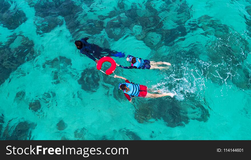 Background blurred People swimming in the sea. Aerial view, Top
