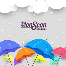 Monsoon Season With Colorful Umbrellas. Stock Photo