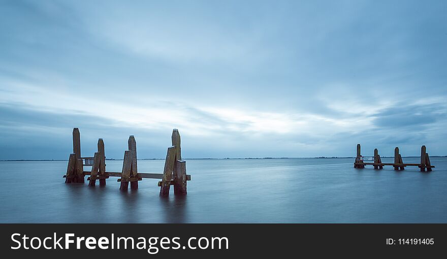 Bollards at the harbor mouth in the Netherlands. Bollards at the harbor mouth in the Netherlands