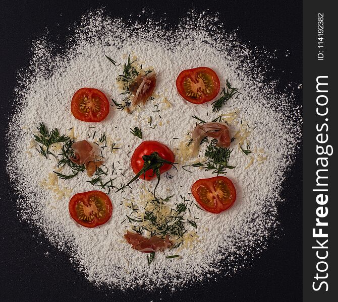 Abstract Image Of Pizza Made From Flour, Tomatoes, Cheese And Jamon. Concept