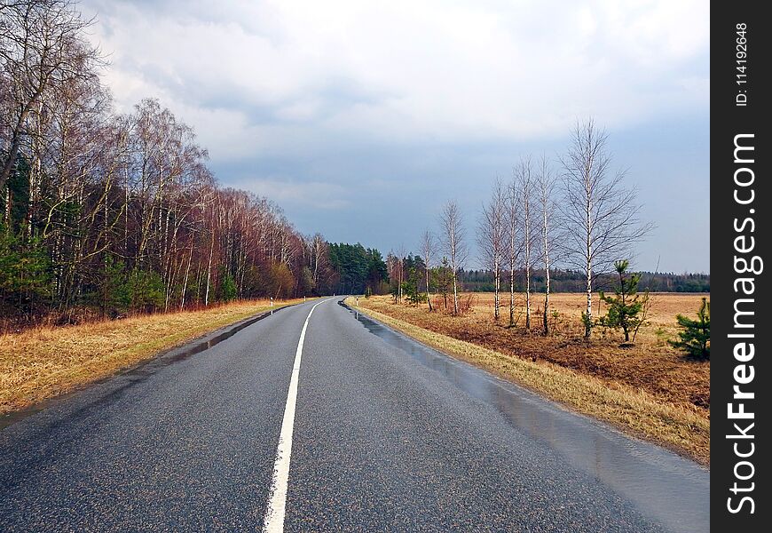 Road and beautiful cloudy sky, Lithuania