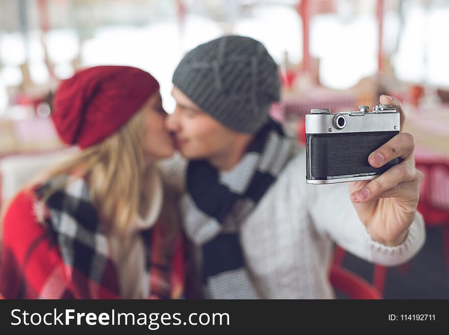 Young couple making selfie in a cafe