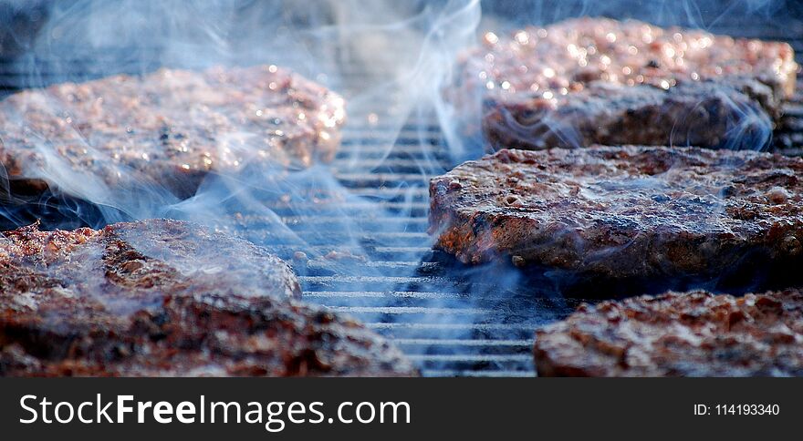 Burgers on the grill.