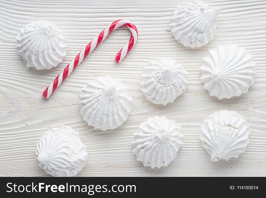 French vanilla meringue cookies close up white christmass background.