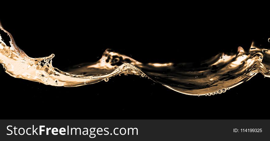 Water smooth with splashes on a black background .
