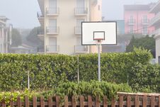 Basketball Structure In An Outdoor Playground Surrounded By Trees In A Park Royalty Free Stock Photography