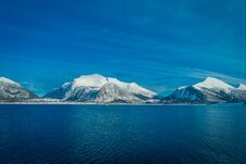 Outdoor View Of Beautiful Mountain Partial Covered With Snow, The In Hurtigruten Region In Norway Stock Photography Outdoor View Of Beautiful Mountain Partial Covered With Snow, The In Hurtigruten Region In Norway Stock Photography