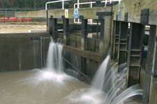 Long Exposure Water Passing Through A Lock Gate Royalty Free Stock Photos Long Exposure Water Passing Through A Lock Gate Royalty Free Stock Photos