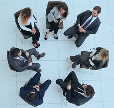 Top View Of Business Team Discussing New Ideas. Stock Image