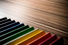Colorful Rainbow Pencils On The Brown Table Background Royalty Free Stock Photos