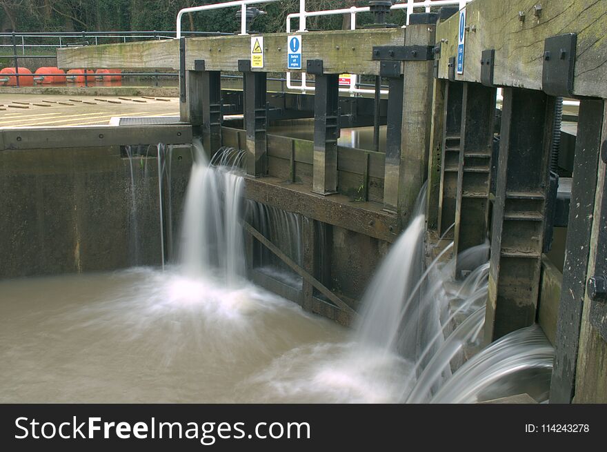 Long exposure water passing through a lock gate