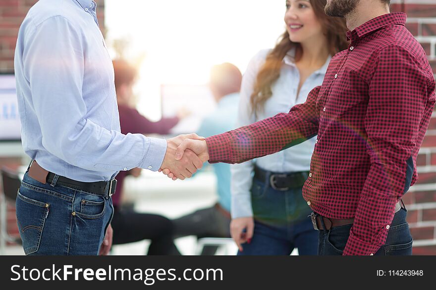 Closeup Image Of Business Partners Making Handshake In An Office