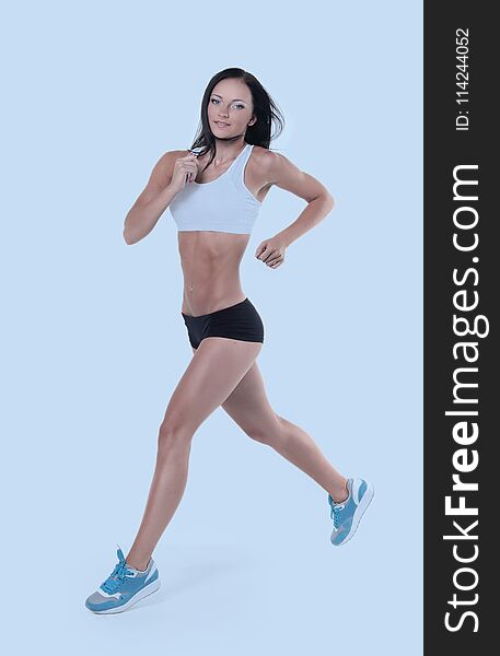 A fit happy, beautiful woman doing aerobic workout. Isolated over white. A fit happy, beautiful woman doing aerobic workout. Isolated over white.