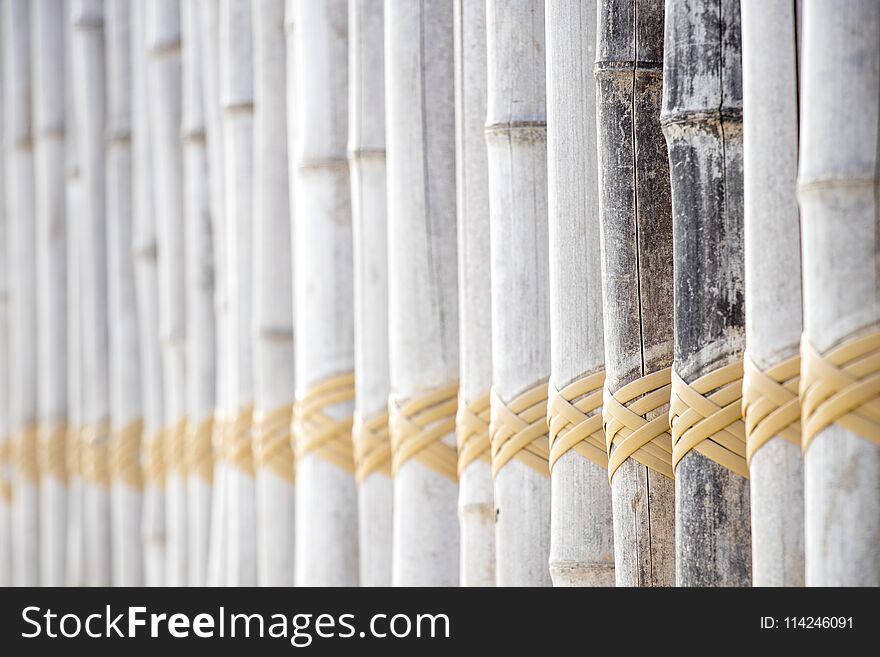 Light color woods and yellow loop rope closeup background