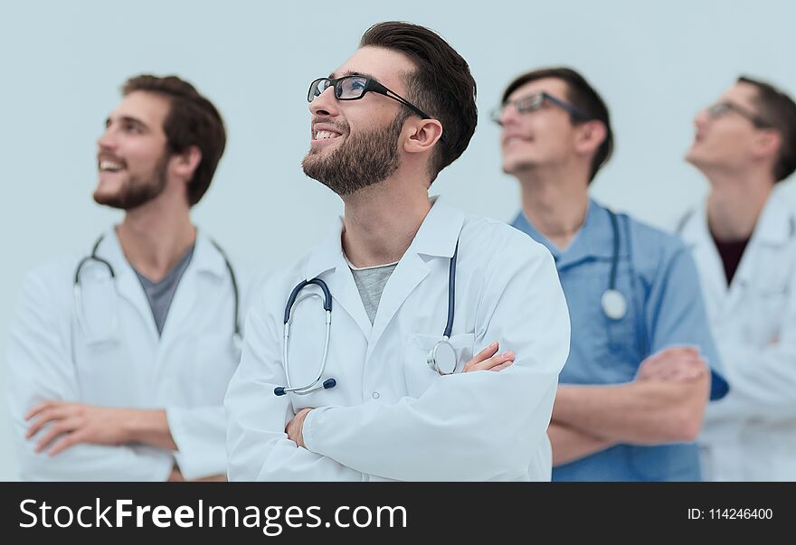 Confident medical team looking at copy space.isolated on white