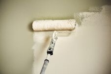 Hand Painting Wall With Paint Roller, Pastel Color. Appartment Renovation, Repair, Building And Home Concept. Copy Space Stock Photo Hand Painting Wall With Paint Roller, Pastel Color. Appartment Renovation, Repair, Building And Home Concept. Copy Space Stock Photo