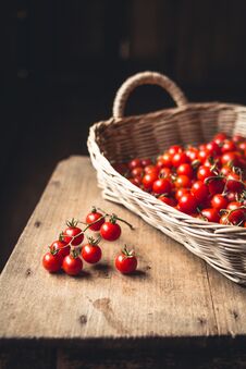 Tomato Cherry In Basket Tomato In Hand South Asia Royalty Free Stock Image