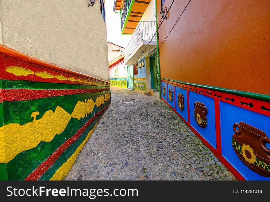 View of the typical mosaic present on the walls of the houses in the streets of Guatapé, Colombia. View of the typical mosaic present on the walls of the houses in the streets of Guatapé, Colombia