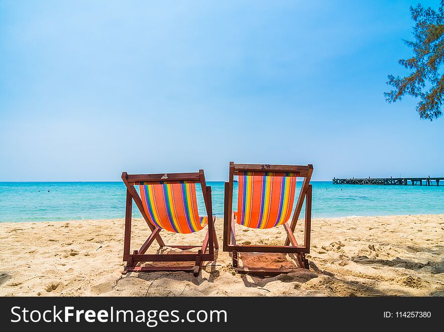 Empty chair on the beach and sea in beautiful island - Holiday Vacation concept
