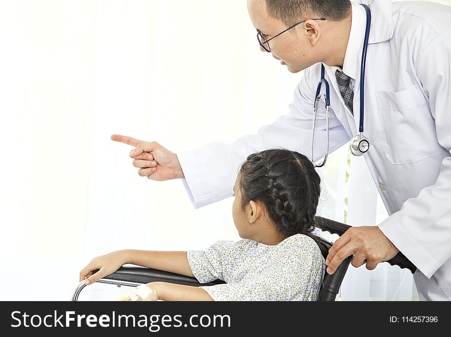 asian doctor touching pediatric patients