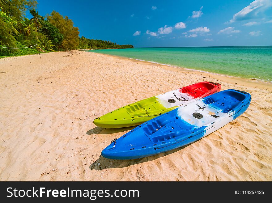 Beautiful paradise beach and sea with kayak boat - Holiday vacation concept