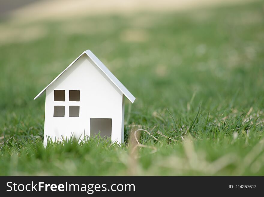 Paper Cut Of House On Nature Background With Copy Space