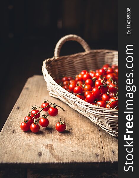 Tomato cherry in basket Tomato in hand South Asia nature light