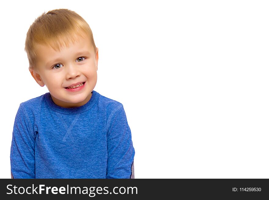 Smiling little boy, studio portrait on white background. The concept of a happy childhood, well-being in the family. Close-up. Isolated. Smiling little boy, studio portrait on white background. The concept of a happy childhood, well-being in the family. Close-up. Isolated.