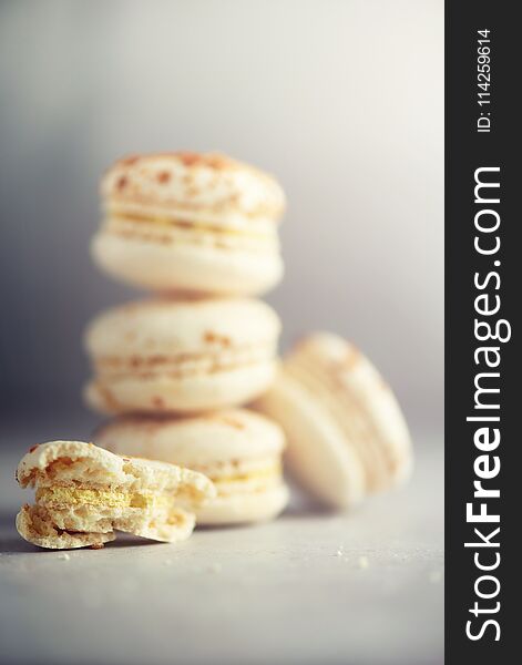 Vanilla Caramel Macarons, Copy Space. Holidays And Celebrations Concept. Sweet Gift For Woman, Girl.