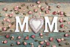Mothers Day Background With Letters And Small Pink Roses On Old Royalty Free Stock Image