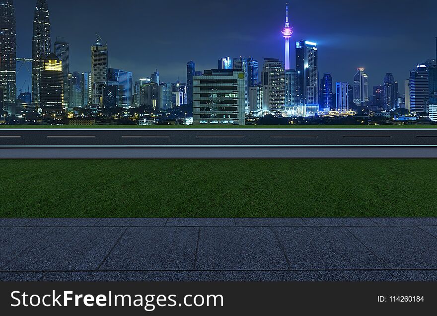 Side angle view empty asphalt road with grass ,stone marble floor and city skyline background . Mixed media .