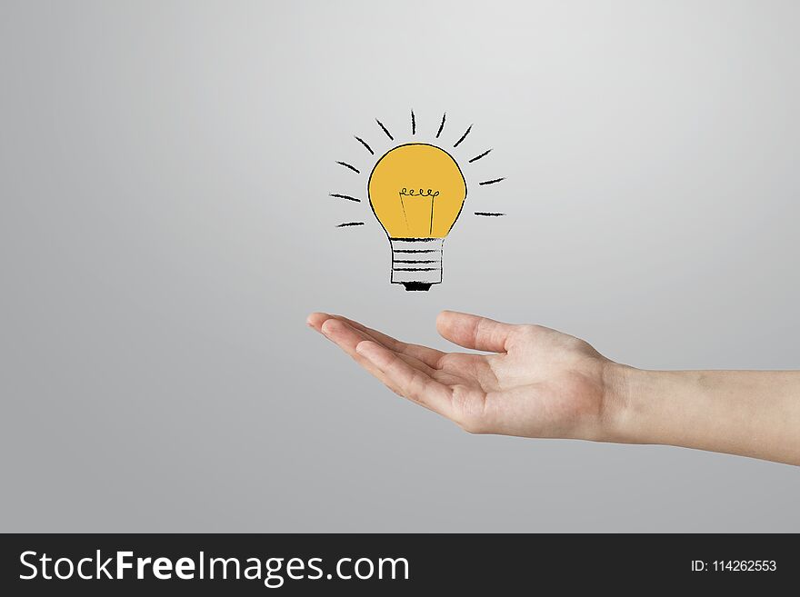Woman hand open hand holding bulb light illustration