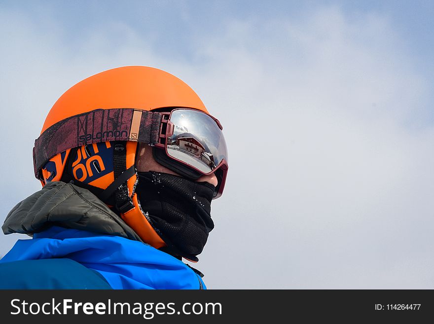 Person Wearing Orange Helmet