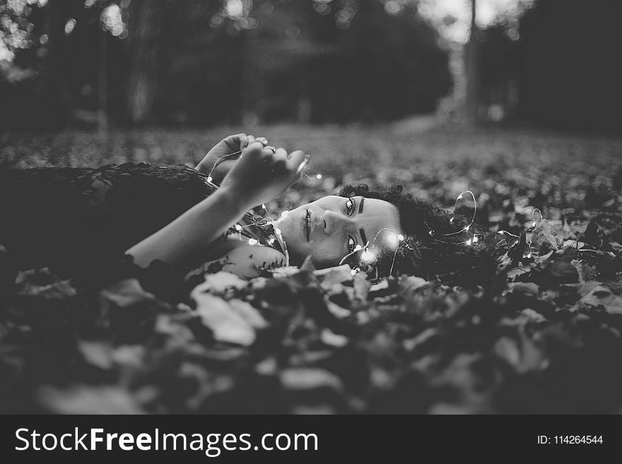 Woman On Leaves