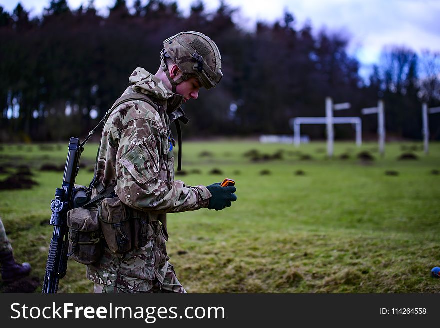 Shallow Focus Photography of Soldier
