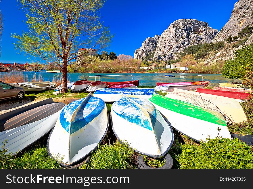 Town of Omis boats on Cetina river view, Dalmatia region of Croatia