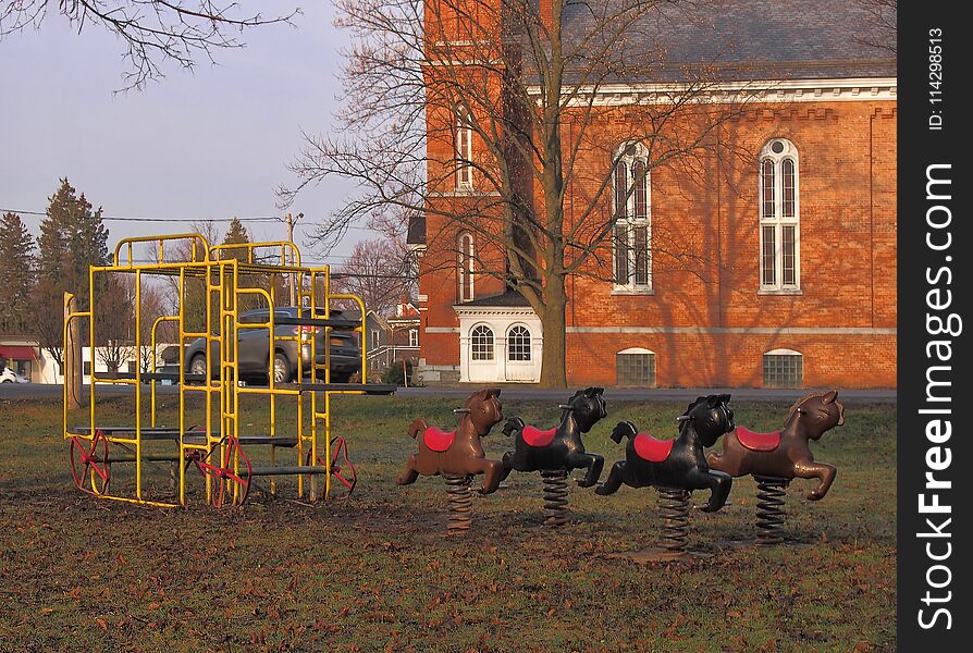 Old fashioned playground equipment in a small village park