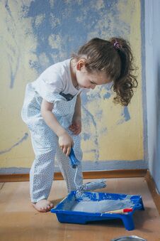 Little Kid Girl Making Renovation At Her Room. Royalty Free Stock Photo