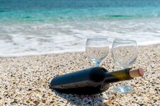 Bottle Of Red Wine With Wine Glasses On The Beach At The Summer Day Royalty Free Stock Photo