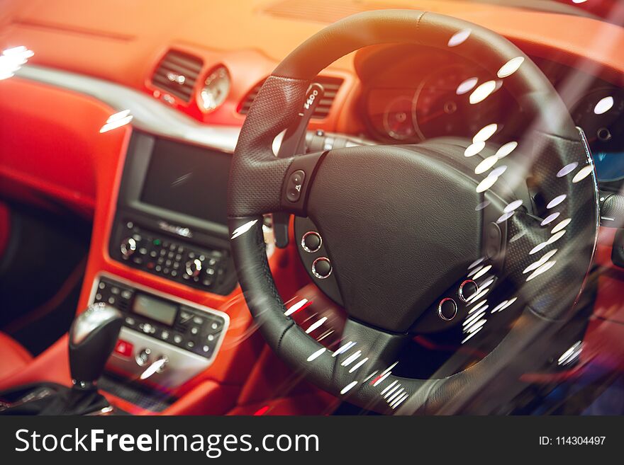 Luxury vehicle interior car dashboard with steering wheel