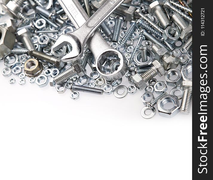 Wrenches on nuts and bolts. Wrenches on nuts and bolts