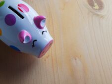 Piggy Bank , Put On Wooden Floor. Royalty Free Stock Photo